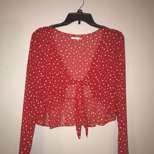 Red top with white polka dots
